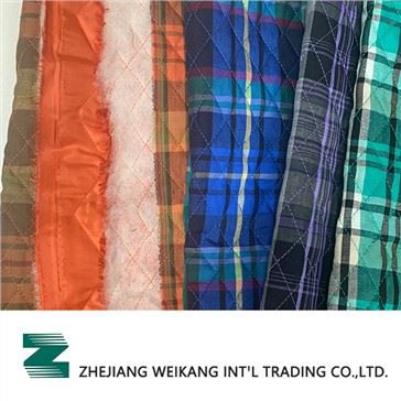 vævet quiltet stof til beklædningsgenstande